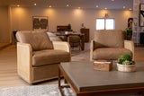 Danson Modern Tan Leather + Wicker Swivel Accent Chair